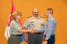 Presenting awards to soldiers who voluntary served their military service