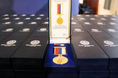 Military commemorative medals presented to members of the 250th AD Missile Brigade