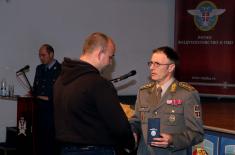 Military commemorative medals presented to members of the 250th AD Missile Brigade