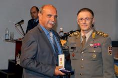 Military commemorative medals presented to members of the 250th AD Missile Brigade