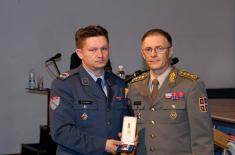 Military commemorative medals presented to members of the 250th AD Missile Brigade