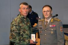 Military commemorative medals presented to members of the 250th AD Missile Brigade