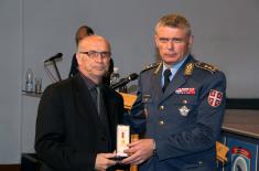 Military commemorative medals presented to members of the 250th AD Missile Brigade