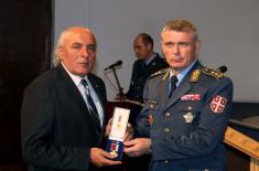 Military commemorative medals presented to members of the 250th AD Missile Brigade