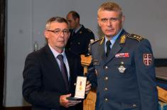 Military commemorative medals presented to members of the 250th AD Missile Brigade