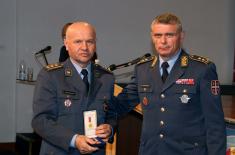 Military commemorative medals presented to members of the 250th AD Missile Brigade