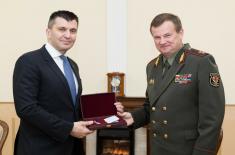 Medal for strengthening military cooperation with Belarus presented to Minister Djordjevic