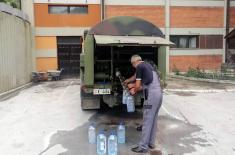 Today as well the Serbian Armed Forces Are Repairing Damaged Roads and Water Supply Installations in Flooded Areas