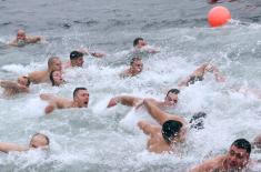 Members of the Serbian Armed Forces swimming for the Holy Epiphany Cross across Serbia