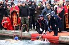 Members of the Serbian Armed Forces swimming for the Holy Epiphany Cross across Serbia