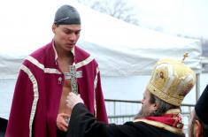 Members of the Serbian Armed Forces swimming for the Holy Epiphany Cross across Serbia