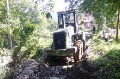 Today as well the Serbian Armed Forces Are Repairing Damaged Roads and Water Supply Installations in Flooded Areas