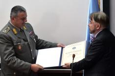 Recognition to the Minister of Defence