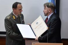 Recognition to the Minister of Defence
