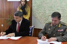 Signing agreements on cooperation at Military Geography Institute