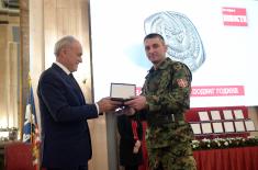 Private 1st Class Uroš Ždero receives Special Plaque for the Noblest Feat of the Year