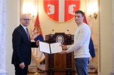 Minister Vučević presents scholarship contracts