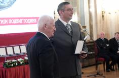 Private 1st Class Uroš Ždero receives Special Plaque for the Noblest Feat of the Year