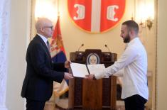 Minister Vučević presents scholarship contracts