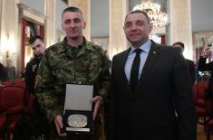 Private 1st Class Uroš Ždero receives Special Plaque for the Noblest Feat of the Year