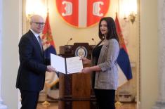 Minister Vučević presents scholarship contracts