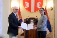 Minister Vučević presents scholarship contracts