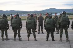 Members of the 63rd Parachute Brigade perform a night jump from 4,500 m