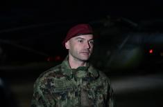 Members of the 63rd Parachute Brigade perform a night jump from 4,500 m