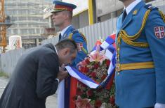 Wreaths laid on memorial plaque to fallen Chinese journalists