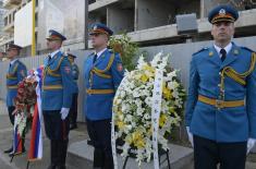 Wreaths laid on memorial plaque to fallen Chinese journalists