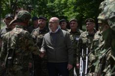 Minister Vučević visits deployed SAF troops