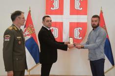 Memorial medals were presented in the Guard Club to the family members of warriors fallen in NATO aggression from the territory of Montenegro