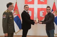 Memorial medals were presented in the Guard Club to the family members of warriors fallen in NATO aggression from the territory of Montenegro