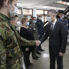 Minister Stefanović and Serbian national shooting team members with military school students  