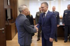 Ambassador Botsan–Kharchenko presents Rostec’s medal to Minister Stefanović