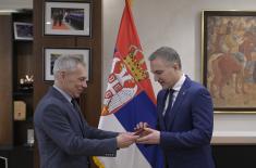 Ambassador Botsan–Kharchenko presents Rostec’s medal to Minister Stefanović