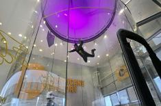 Military paratroopers undergo wind tunnel training
