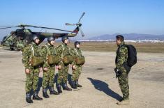 Soldiers performing military service make their first parachute jumps