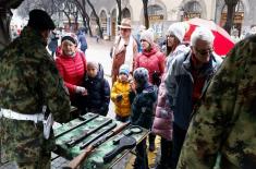 Ceremonial March-Past of Military Bands and Arms Presentation in the Towns of Serbia