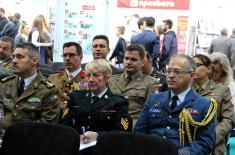 Military attachés visit the booth of the Ministry of Defence and the Serbian Armed Forces at the Book Fair