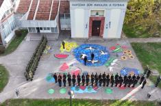 Military Academy cadets, University of Criminal Investigation and Police Studies students march together